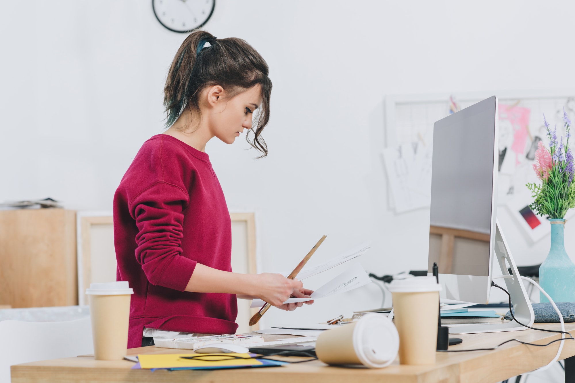 pretty-lady-working-on-designs-by-table.jpg